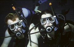 Me and my wife during an educational dive in the local swimming pool